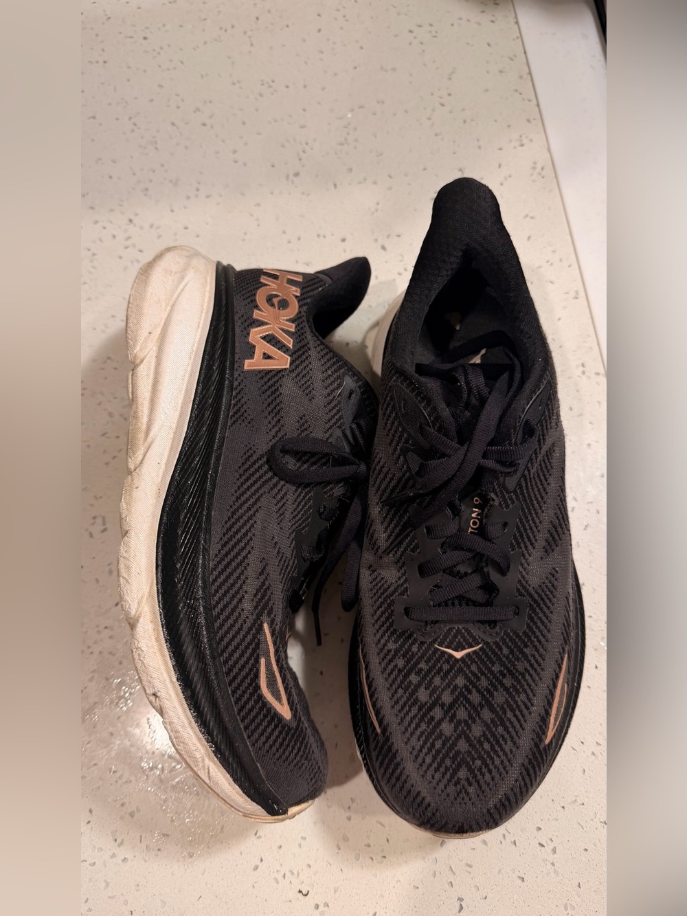 Hoka Black Sneakers with Metallic Pink Accents